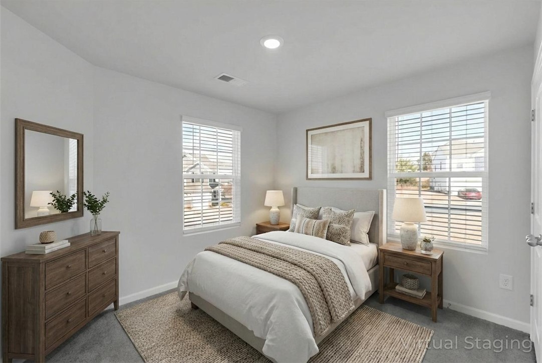 515 Brasstown Court Pendleton, SC 29670 - Photo 17 of 25 This virtually staged third bedroom features ample natural light, creating a serene and comfortable retreat.