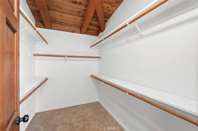 a view of staircase with white walls