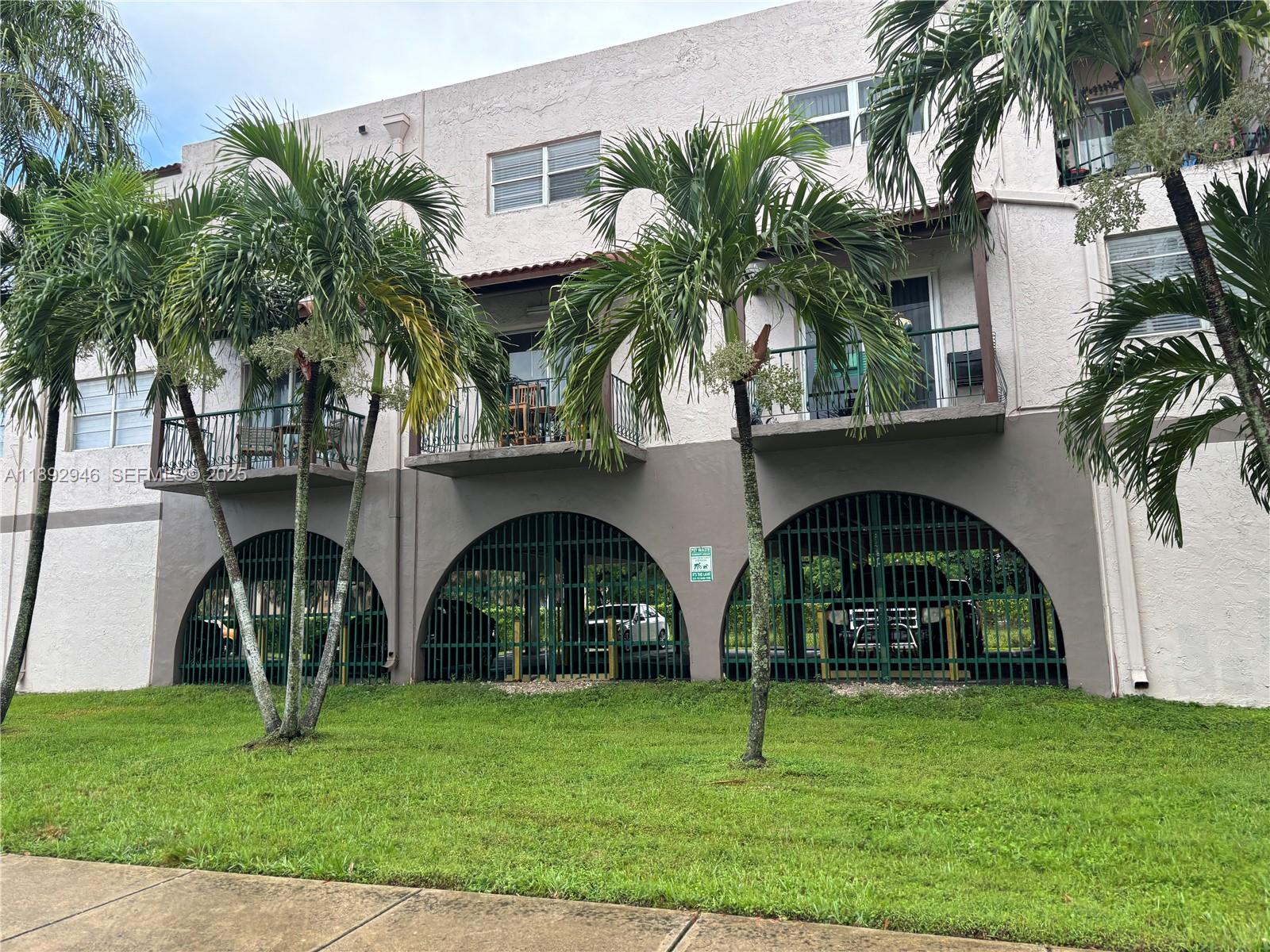 a view of house with yard and entertaining space