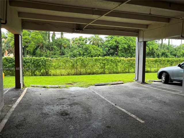 a view of a garden with an outdoor space