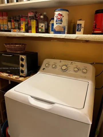 a utility room with washer and dryer