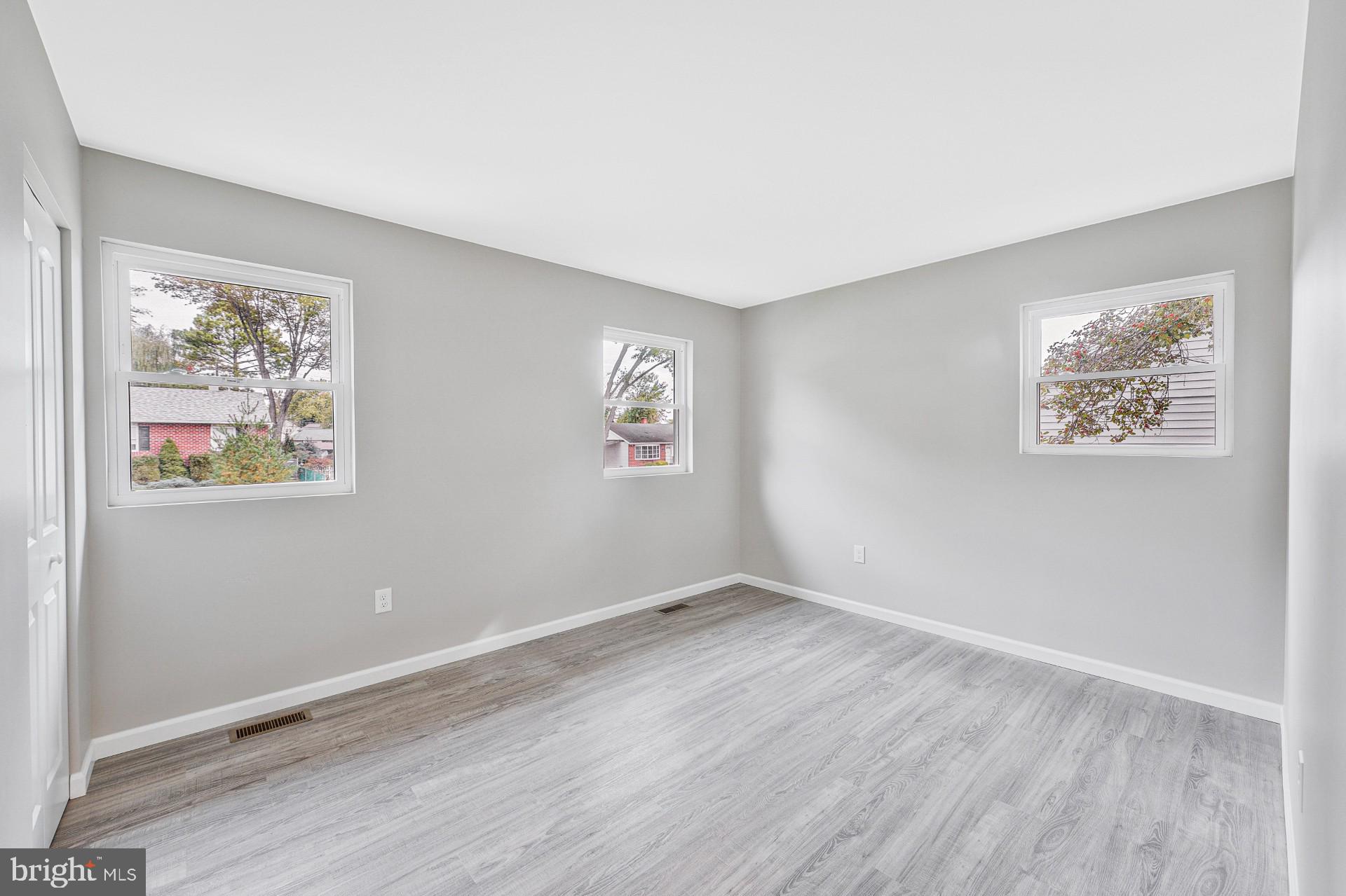 237 Candytuft Road Reisterstown, MD 21136 - Photo 23 of 34 a view of room with window and wooden floor