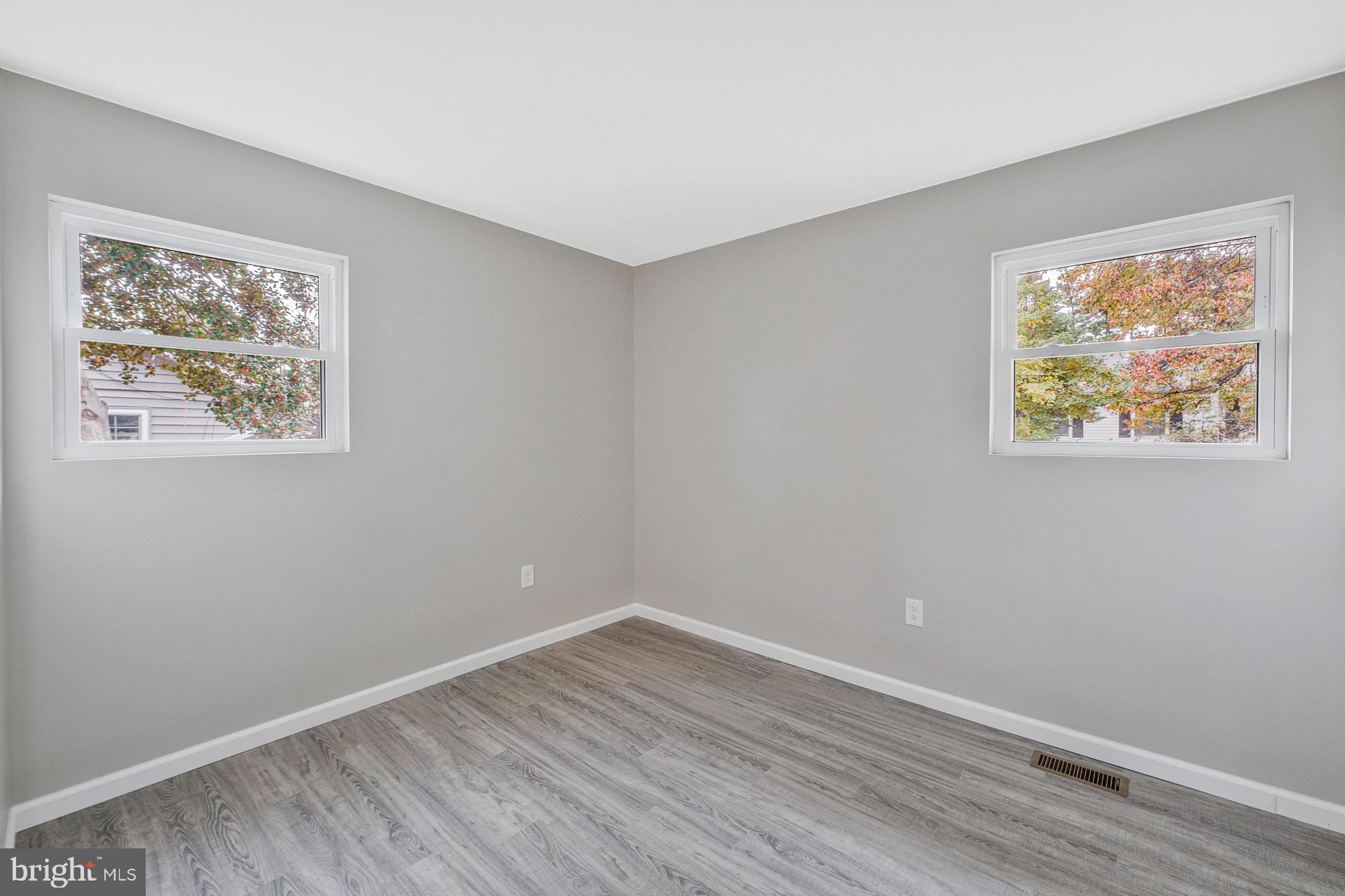 237 Candytuft Road Reisterstown, MD 21136 - Photo 26 of 34 a view of room with window and wooden floor
