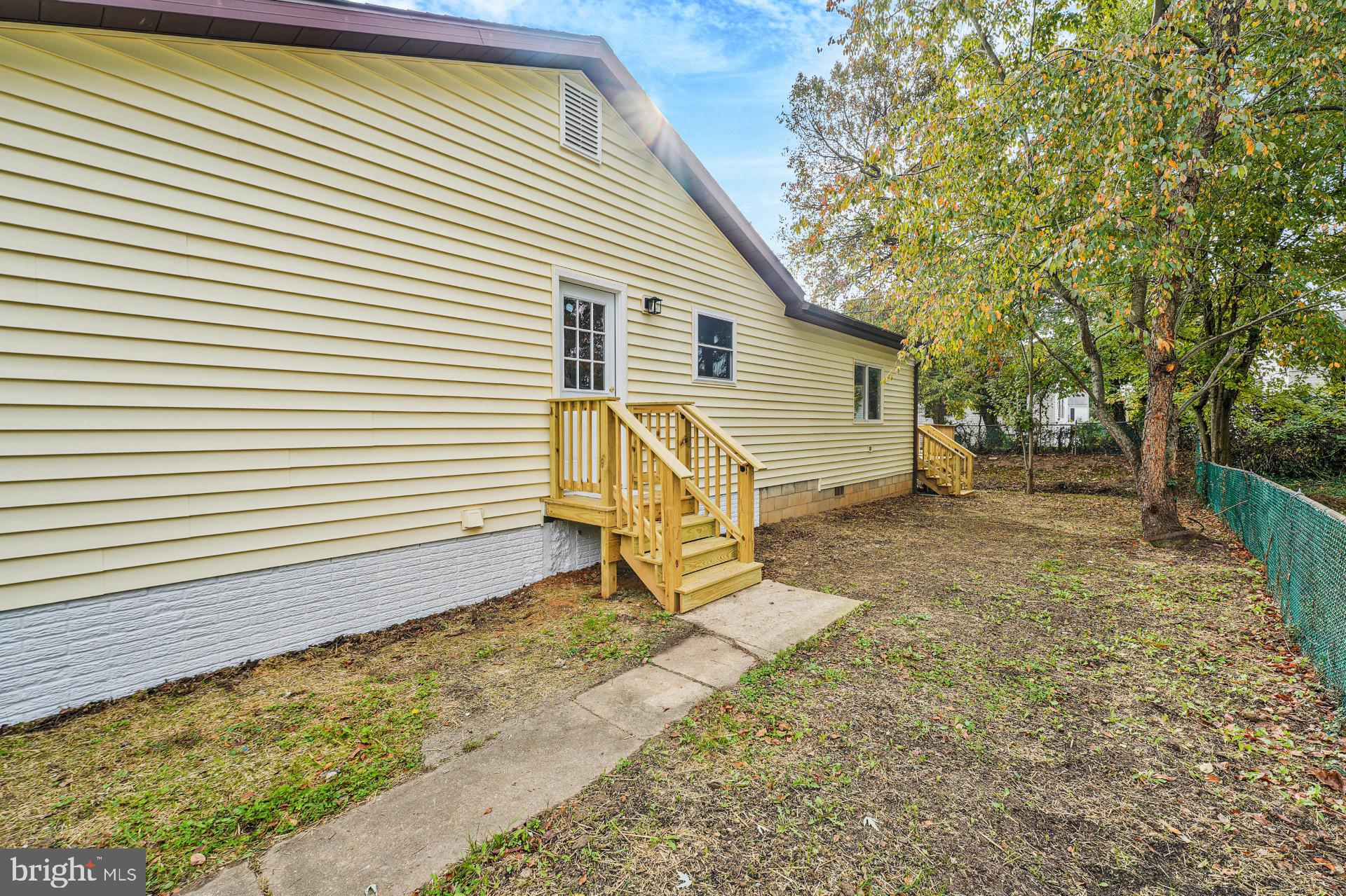 237 Candytuft Road Reisterstown, MD 21136 - Photo 3 of 34 a view of a house with backyard and a tree