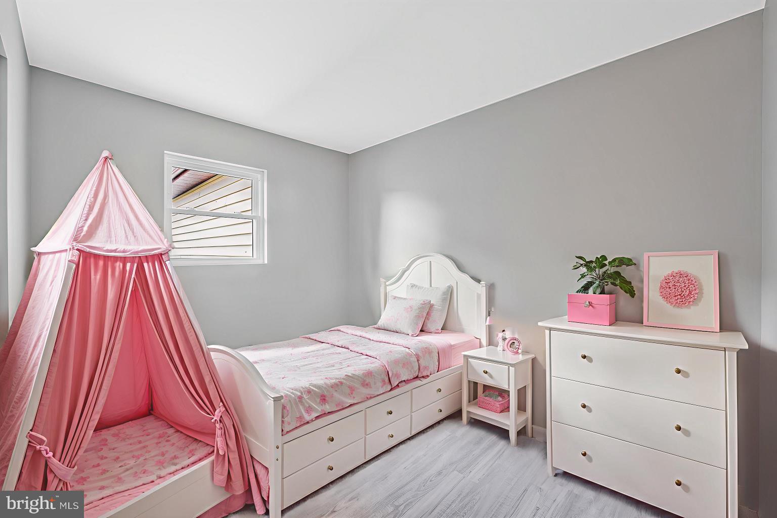 237 Candytuft Road Reisterstown, MD 21136 - Photo 31 of 34 a bedroom with a bed and a cabinets