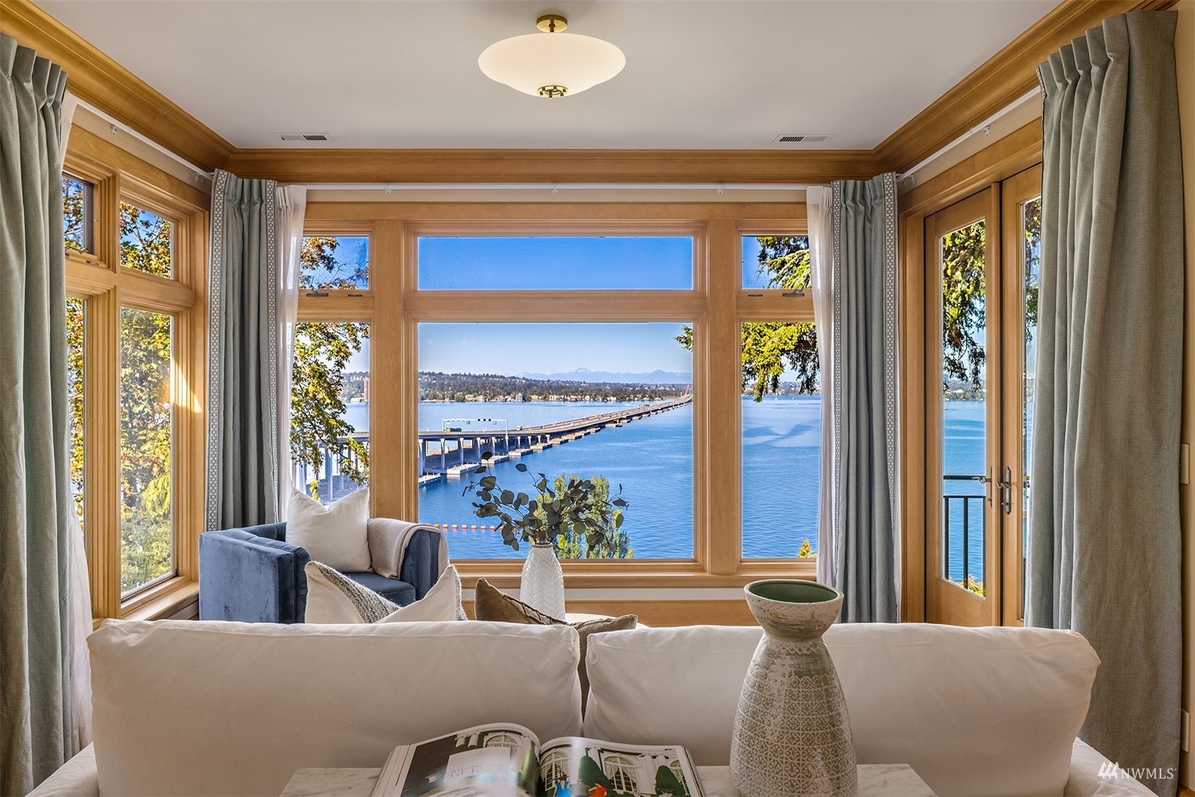 3235 Evergreen Point Road Medina, WA 98039 - Photo 17 of 39 a living room with furniture and a large window