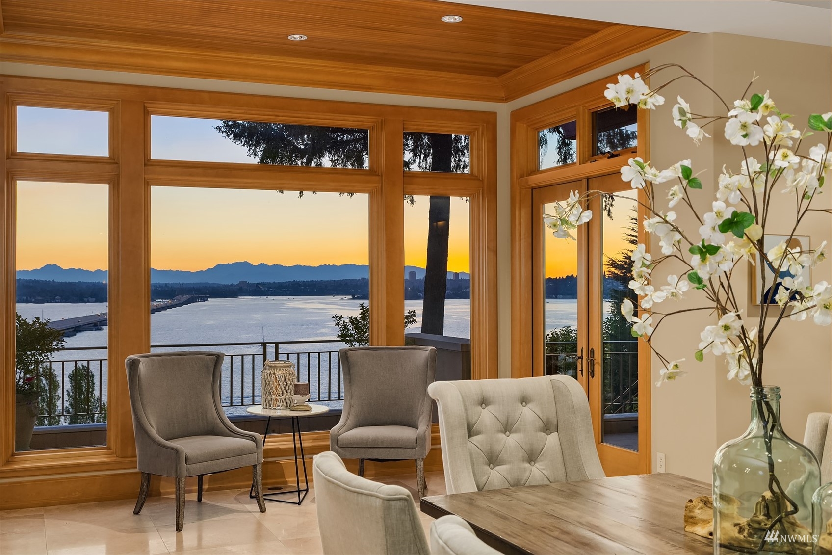 3235 Evergreen Point Road Medina, WA 98039 - Photo 2 of 39 a living room with furniture and a floor to ceiling window