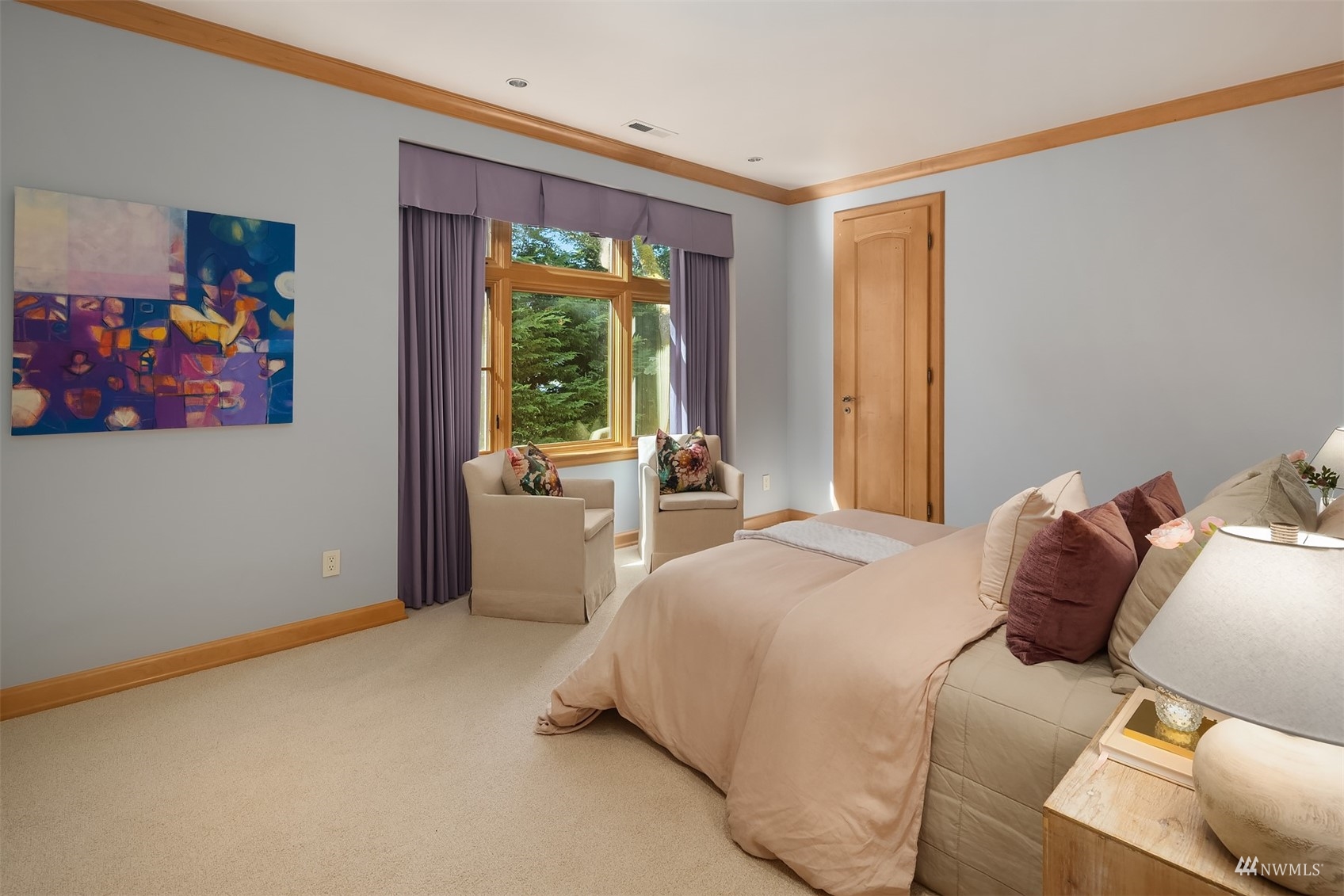 3235 Evergreen Point Road Medina, WA 98039 - Photo 22 of 39 a bedroom with a bed and a window