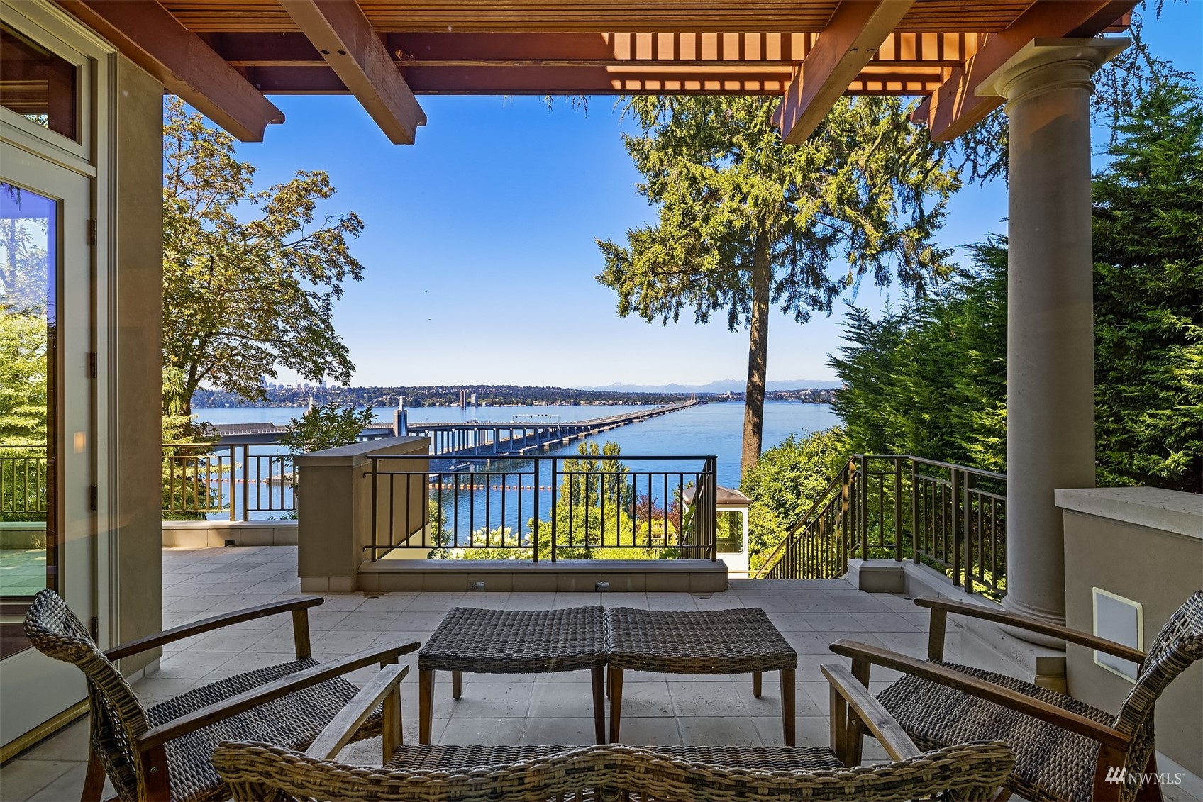 3235 Evergreen Point Road Medina, WA 98039 - Photo 25 of 39 a view of a chairs and table in patio with potted plants