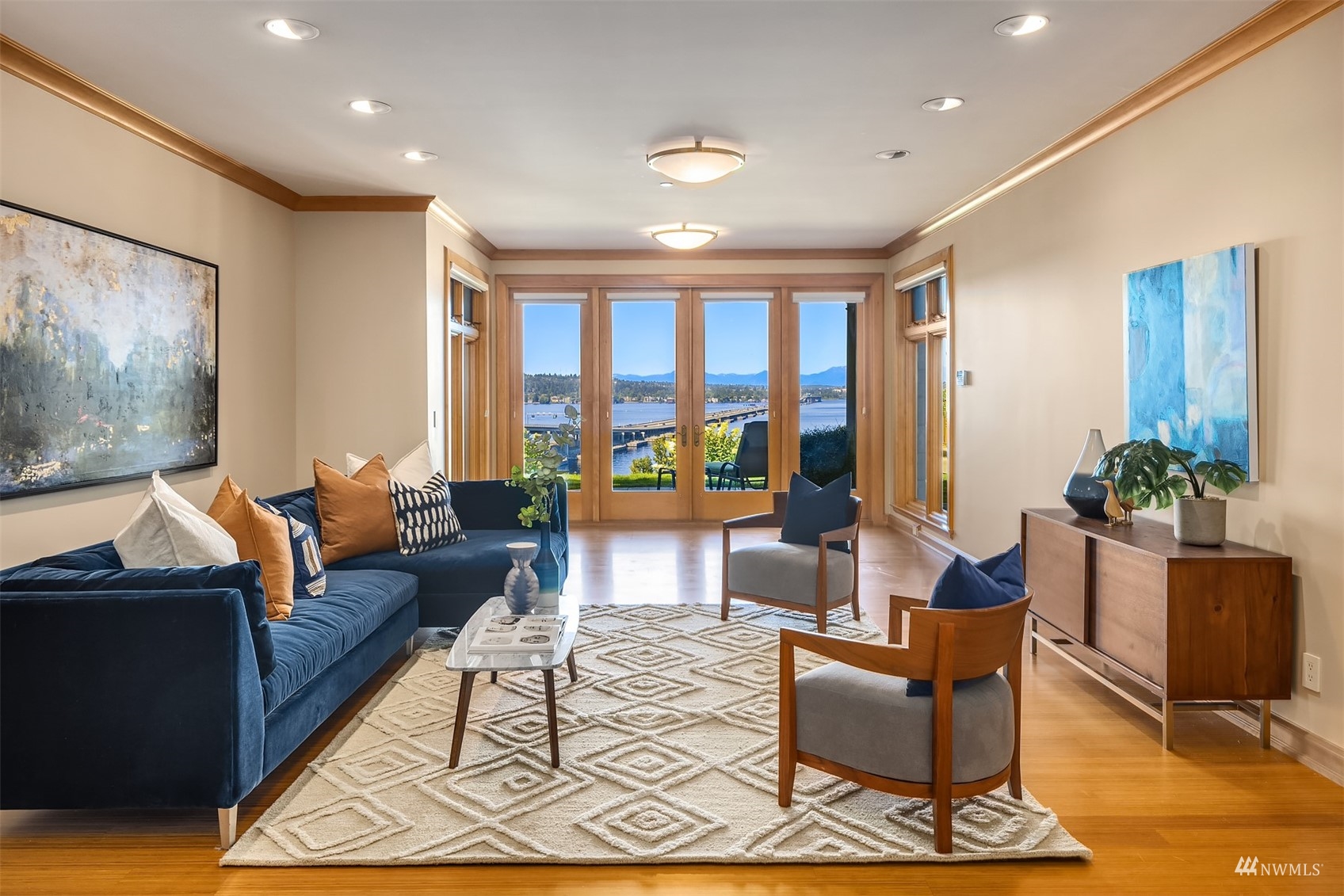 3235 Evergreen Point Road Medina, WA 98039 - Photo 27 of 39 a living room with furniture and a floor to ceiling window