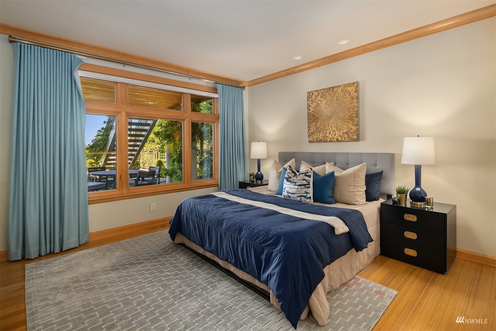 3235 Evergreen Point Road Medina, WA 98039 - Photo 28 of 39 a bedroom with a bed and a large window
