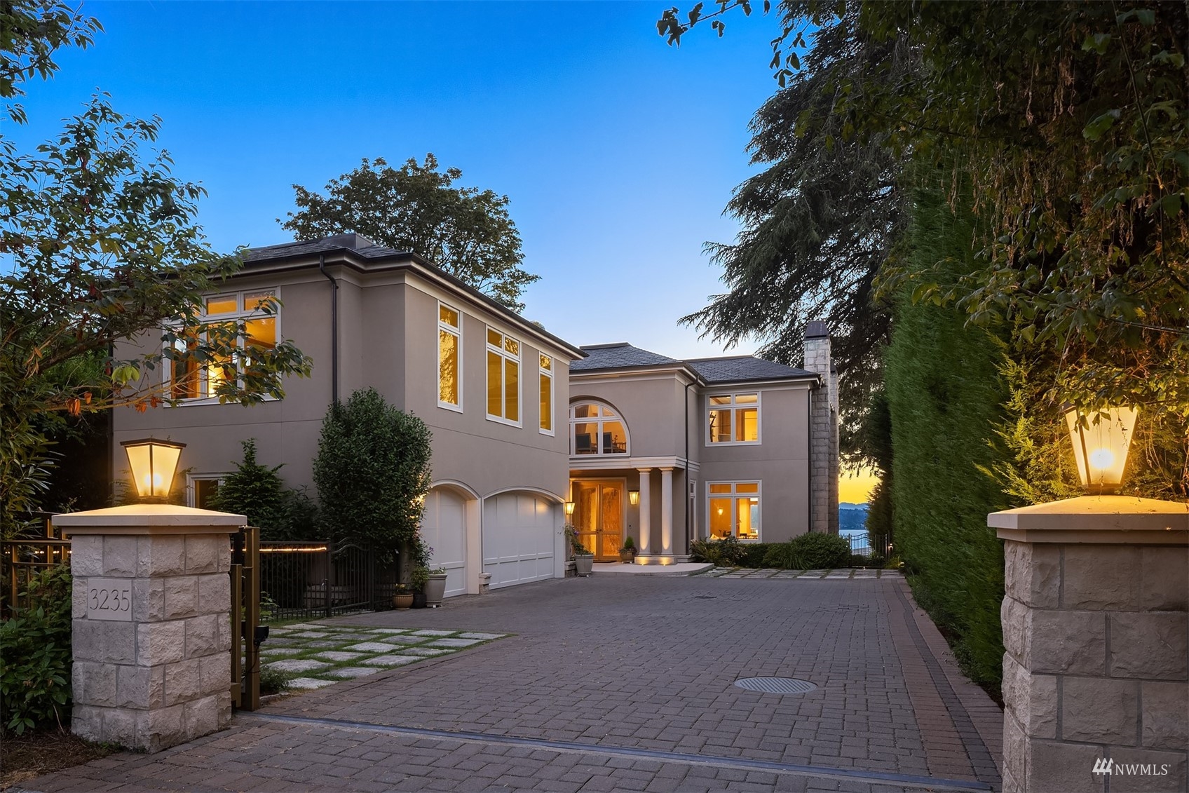 3235 Evergreen Point Road Medina, WA 98039 - Photo 38 of 39 a front view of a house with a yard