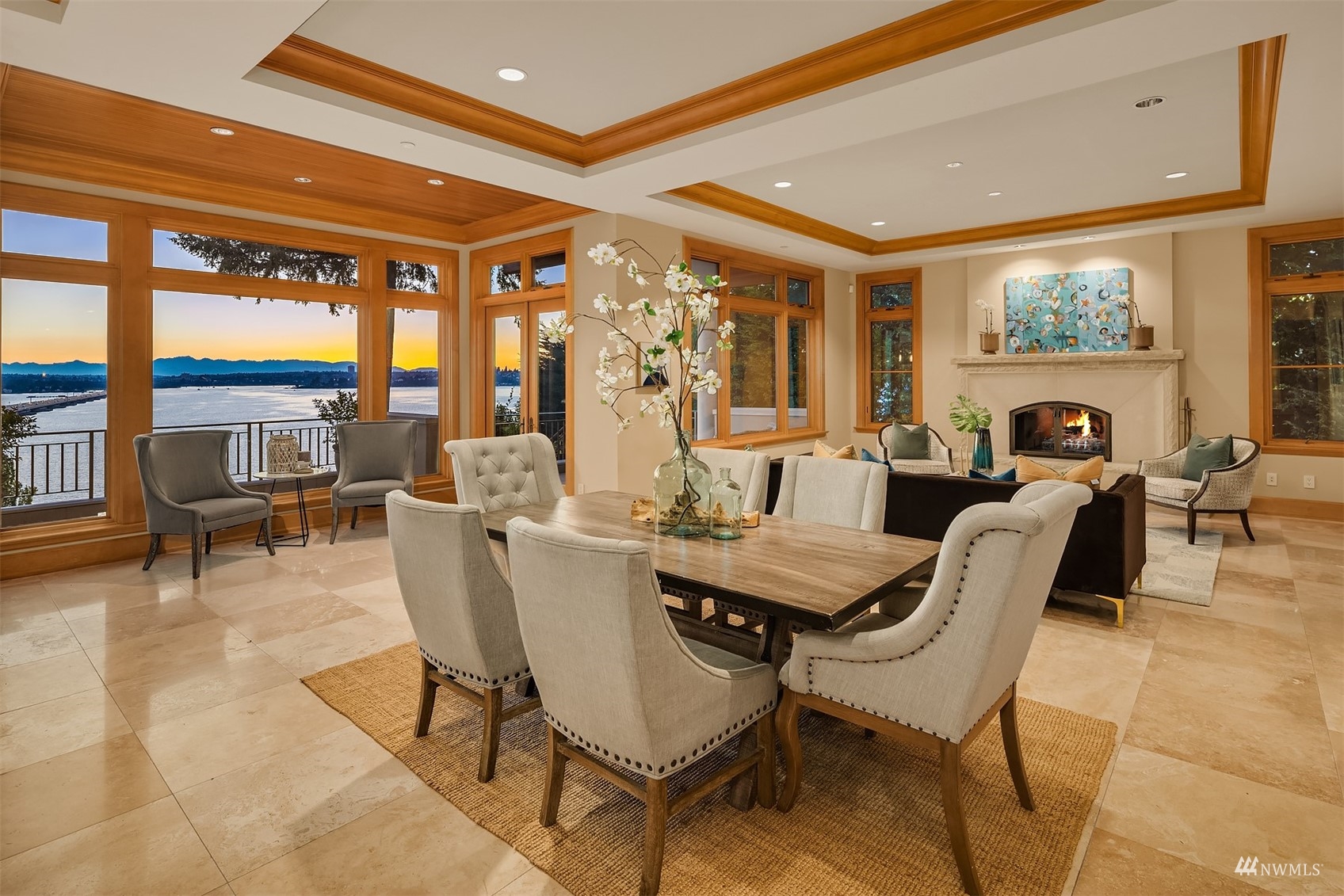 3235 Evergreen Point Road Medina, WA 98039 - Photo 6 of 39 a view of a dining room with furniture large windows and wooden floor