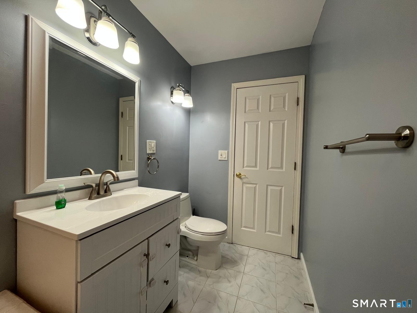 221 Cottonwood Road, Unit 221 Newington, CT 06111 - Photo 13 of 26 a bathroom with a sink a toilet and shower
