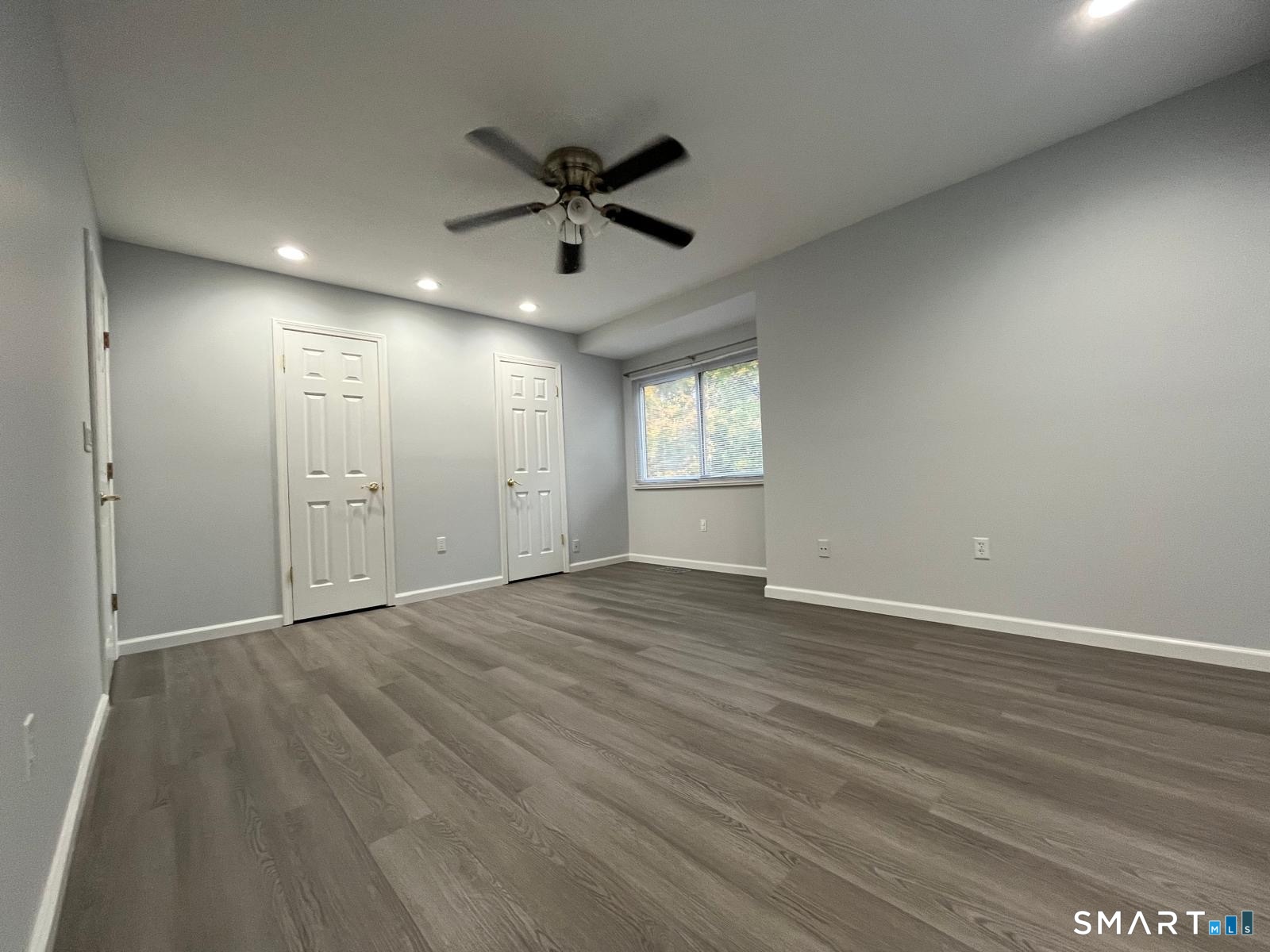 221 Cottonwood Road, Unit 221 Newington, CT 06111 - Photo 23 of 26 a view of an empty room with a window