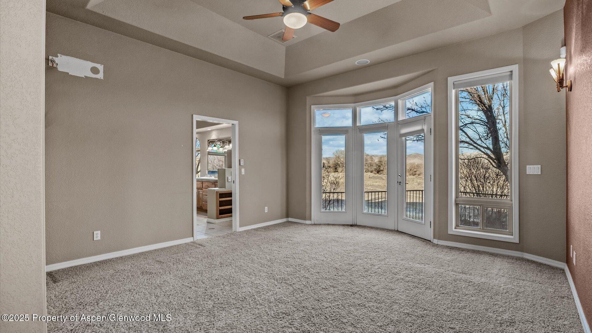 2426 H Road Grand Junction, CO 81505 - Photo 18 of 39 an empty room with windows and closet
