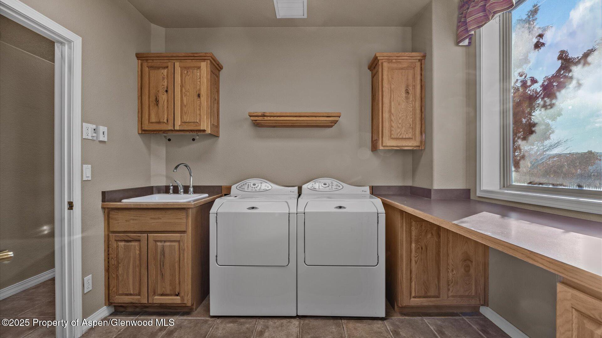 2426 H Road Grand Junction, CO 81505 - Photo 23 of 39 a utility room with dryer and washer