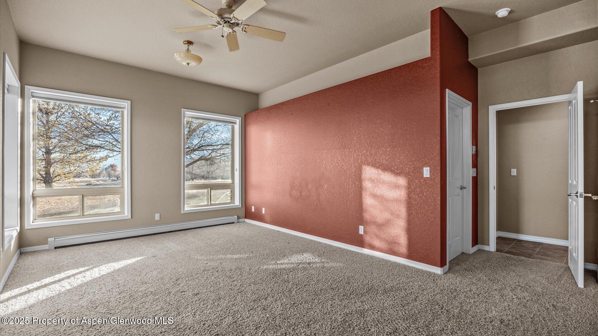 2426 H Road Grand Junction, CO 81505 - Photo 27 of 39 an empty room with windows and closet