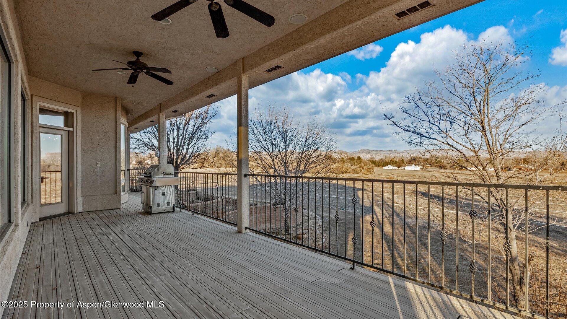 2426 H Road Grand Junction, CO 81505 - Photo 32 of 39 a view of a balcony with wooden floor