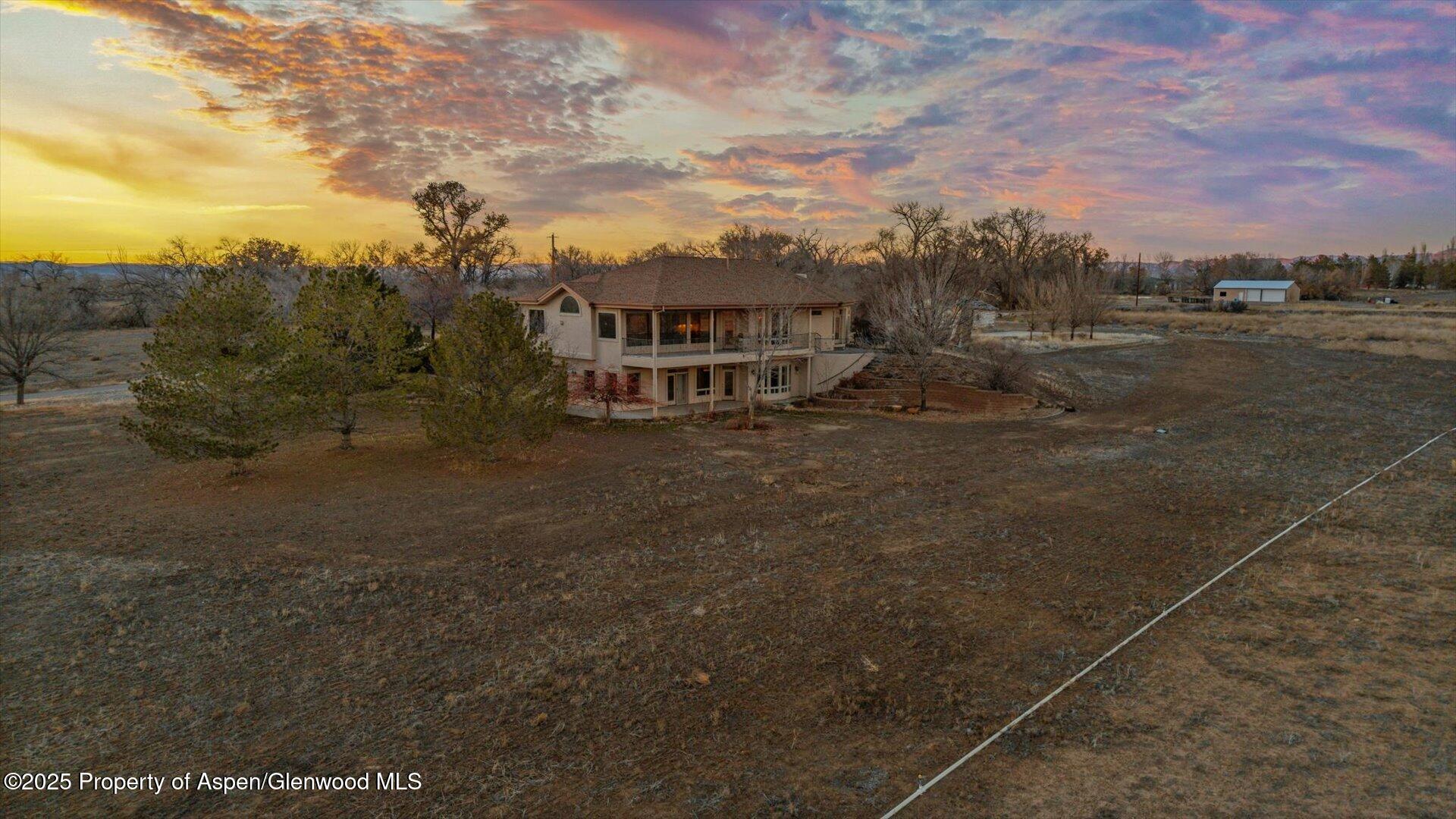 2426 H Road Grand Junction, CO 81505 - Photo 34 of 39 a view of a building with a yard