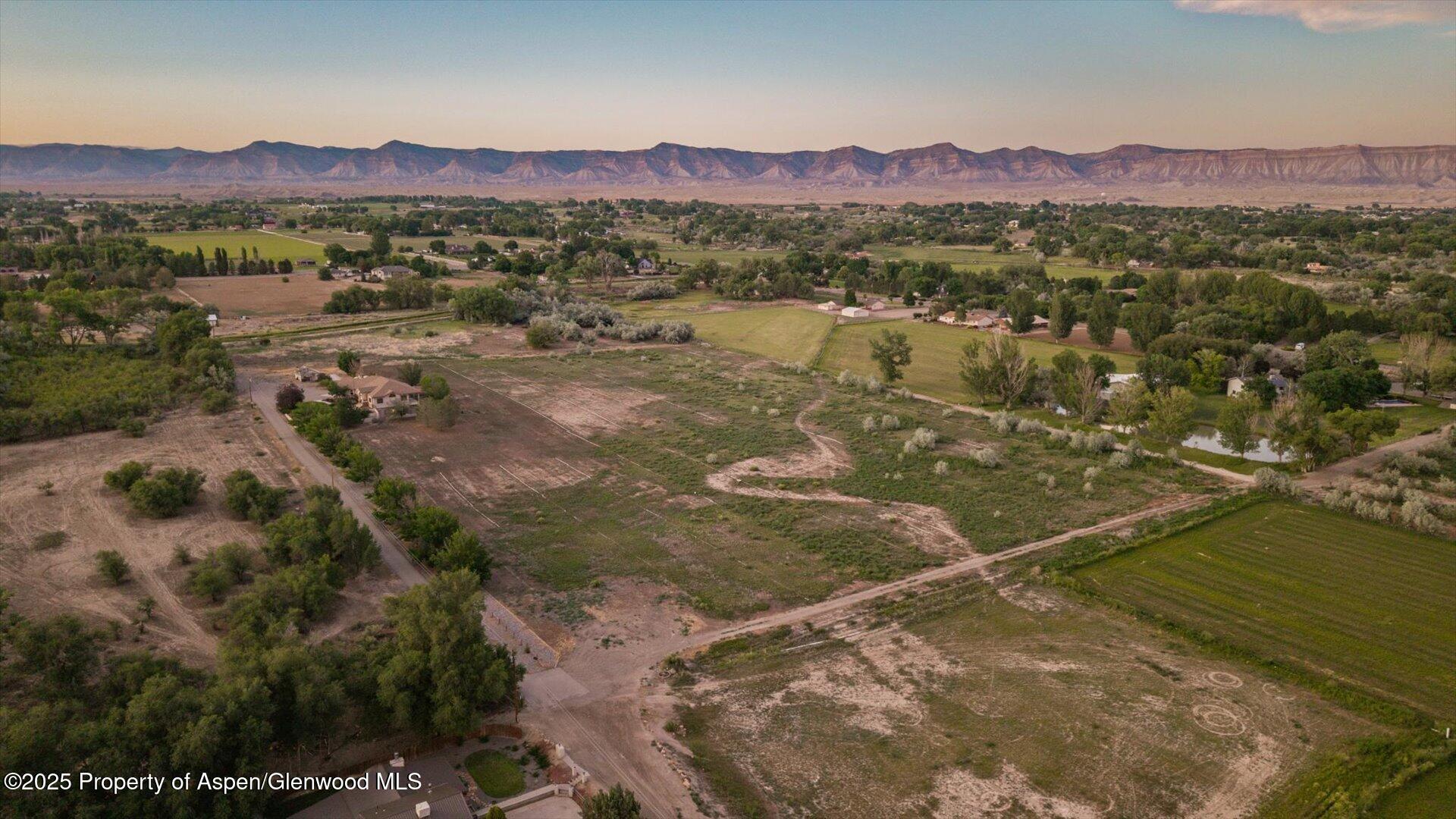 2426 H Road Grand Junction, CO 81505 - Photo 37 of 39 a view of a city with mountains in the background