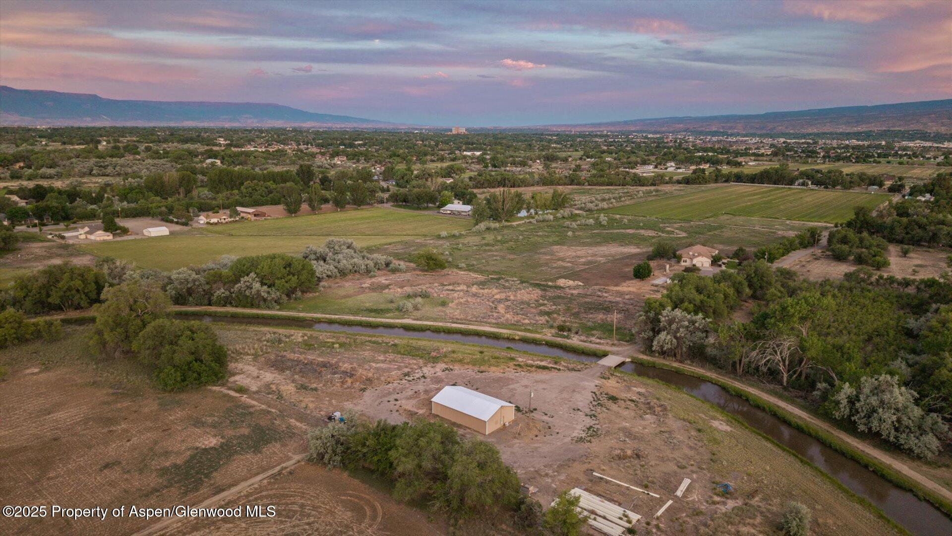 2426 H Road Grand Junction, CO 81505 - Photo 38 of 39 a view of a lake with a mountain