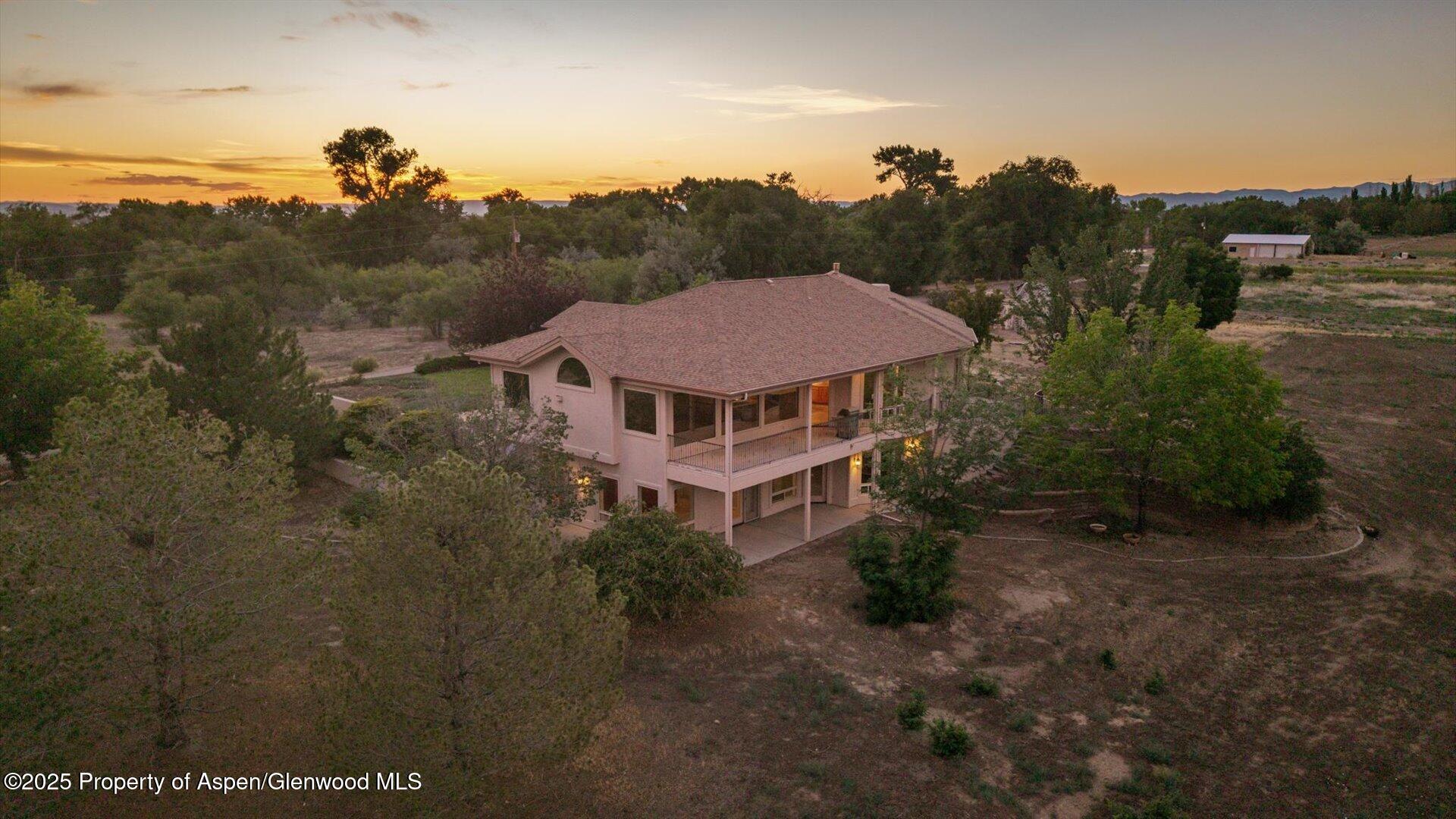 2426 H Road Grand Junction, CO 81505 - Photo 4 of 39 a aerial view of a house with a yard
