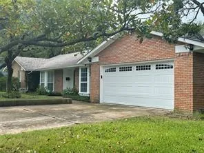 a house with a tree in front of it