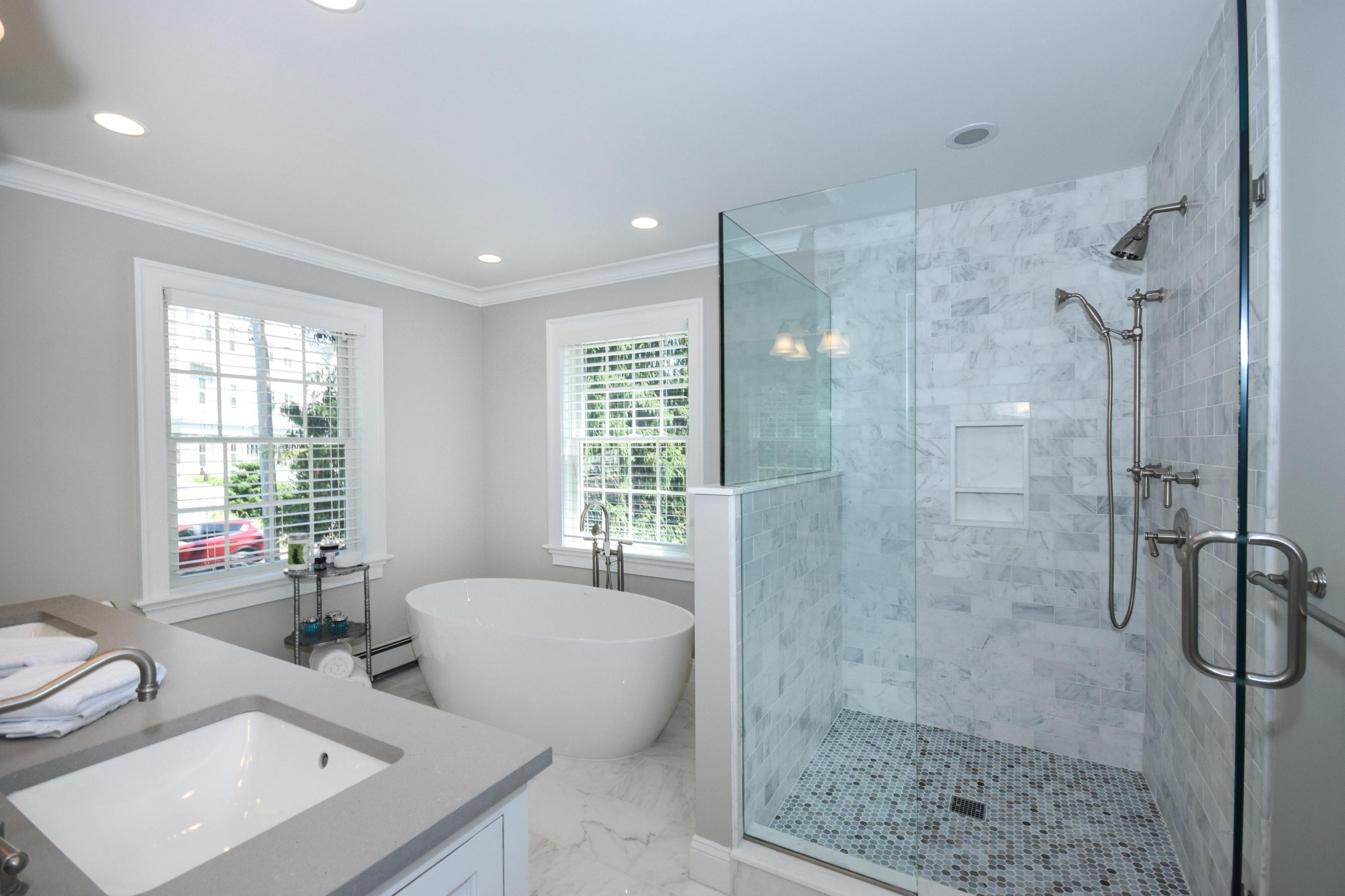 29 Brookside Road Darien, CT 06820 - Photo 11 of 26 a spacious bathroom with a shower sink and mirror