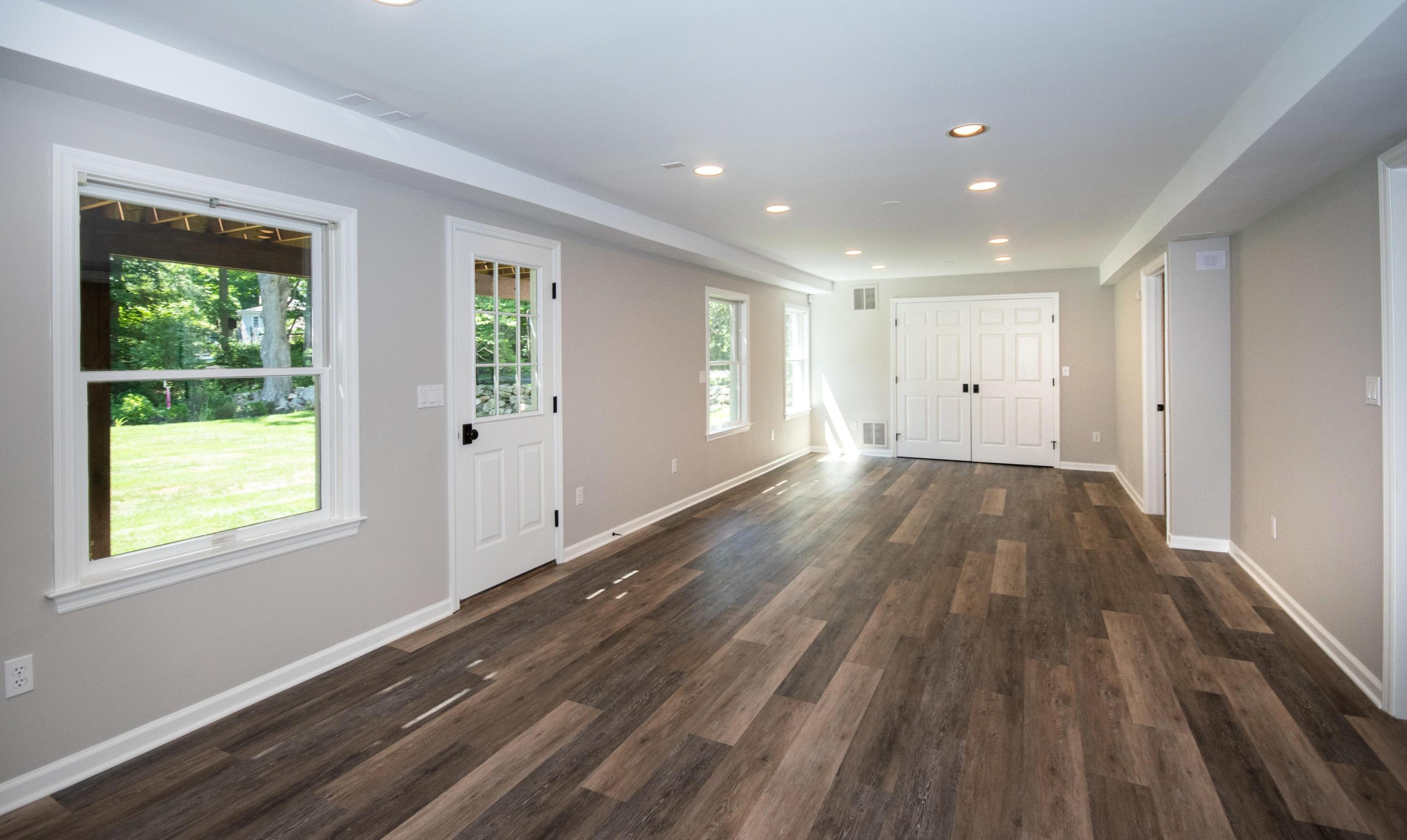 29 Brookside Road Darien, CT 06820 - Photo 20 of 26 a view of an empty room with wooden floor and a window