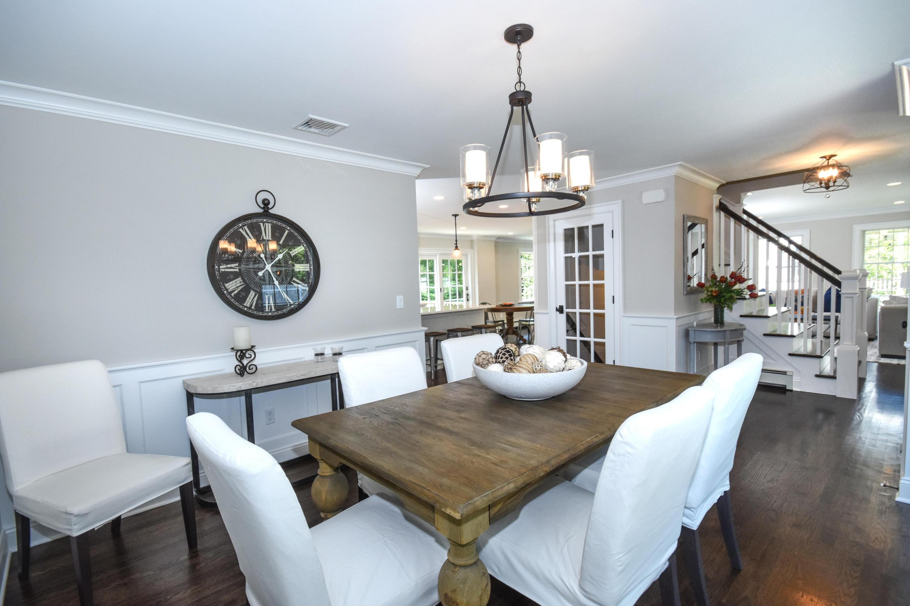 29 Brookside Road Darien, CT 06820 - Photo 4 of 26 a view of a dining room with furniture wooden floor and a chandelier