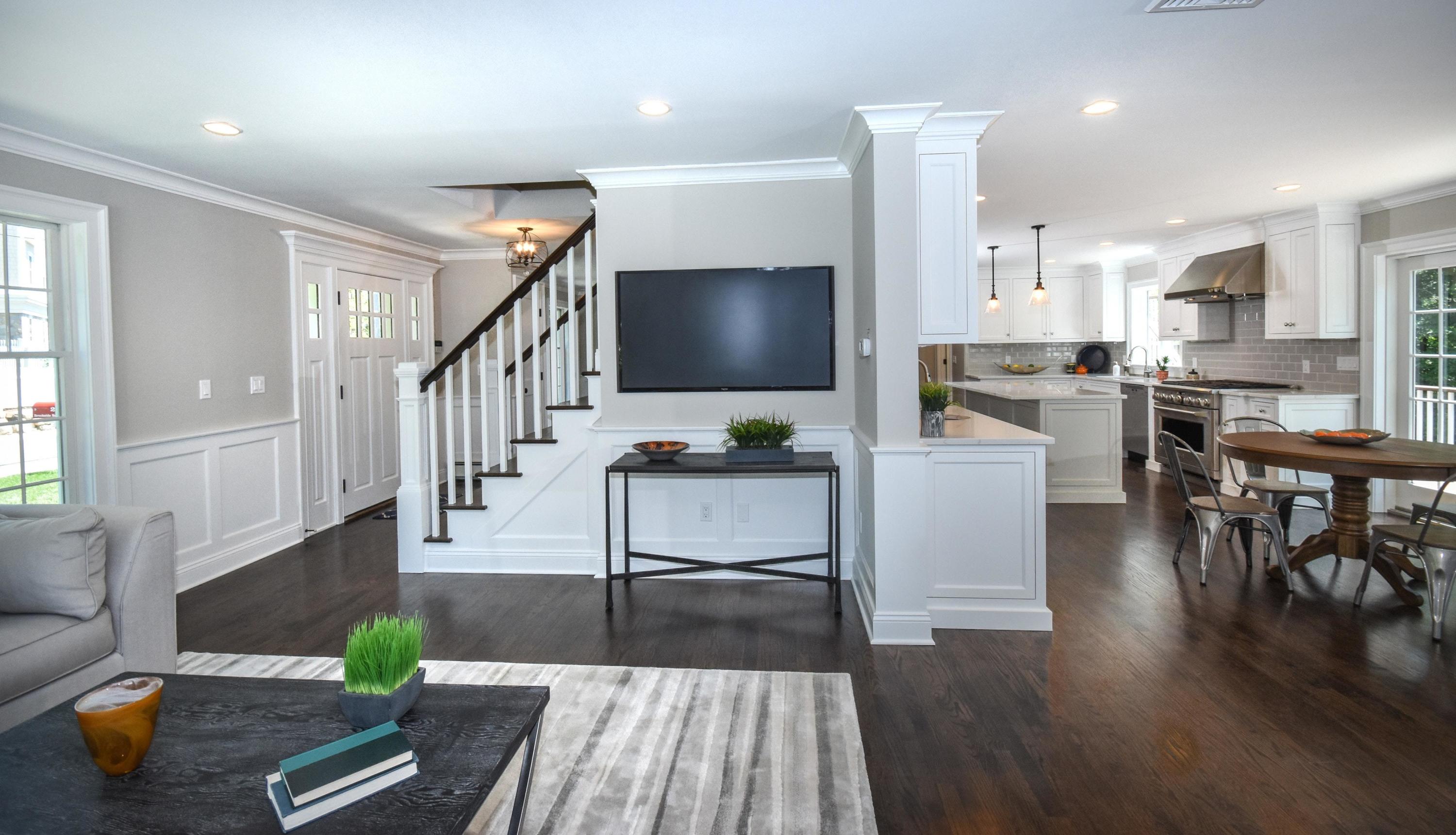 29 Brookside Road Darien, CT 06820 - Photo 9 of 26 a living room with furniture and a wooden floor