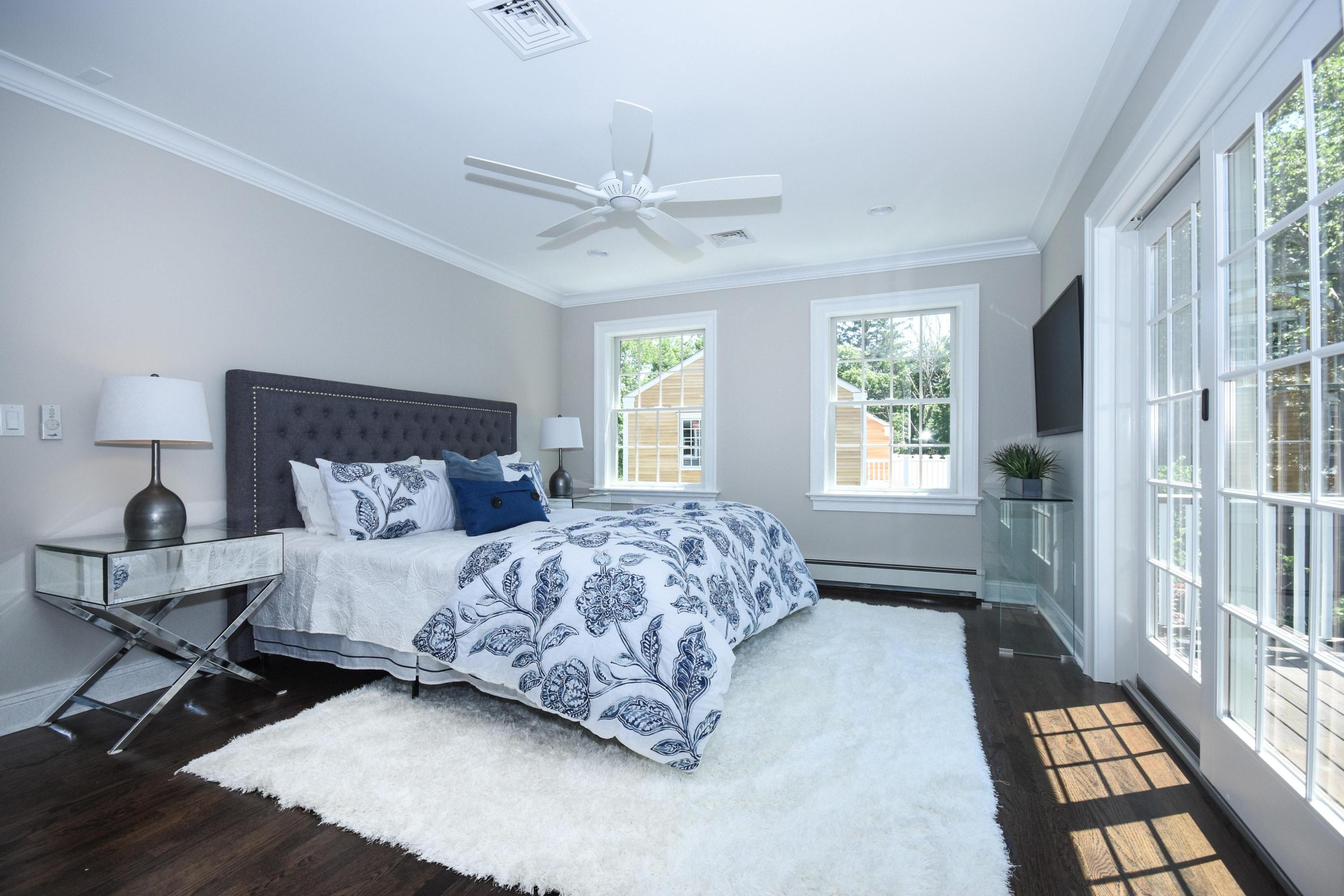 29 Brookside Road Darien, CT 06820 - Photo 10 of 26 a bedroom with a bed and a window