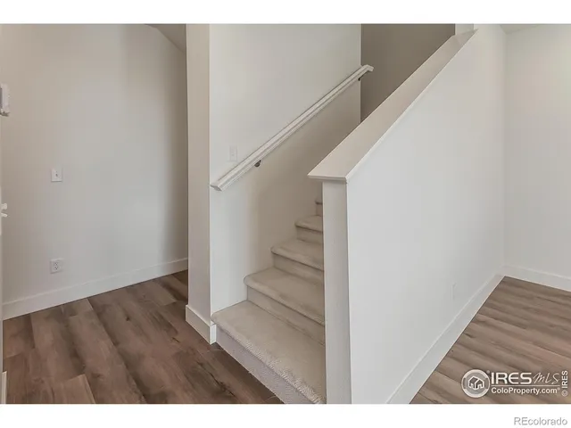 a view of entryway with stairs