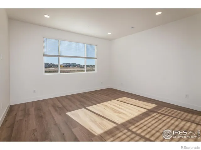 a view of an empty room and window