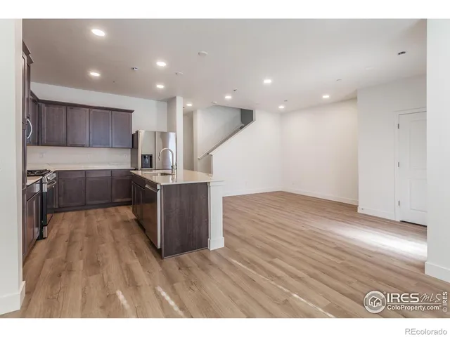 a view of kitchen with wooden floor
