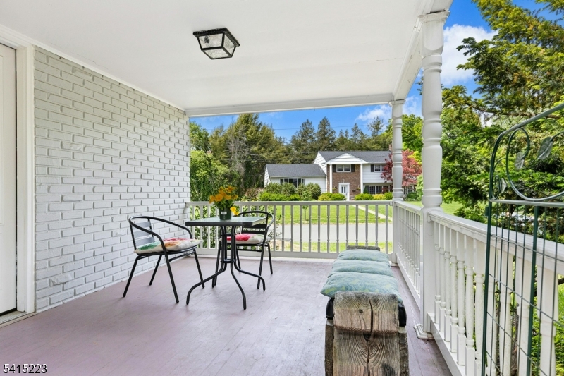 33 Carol Road Westfield, NJ 07090 - Photo 18 of 23 a balcony with furniture and potted plant