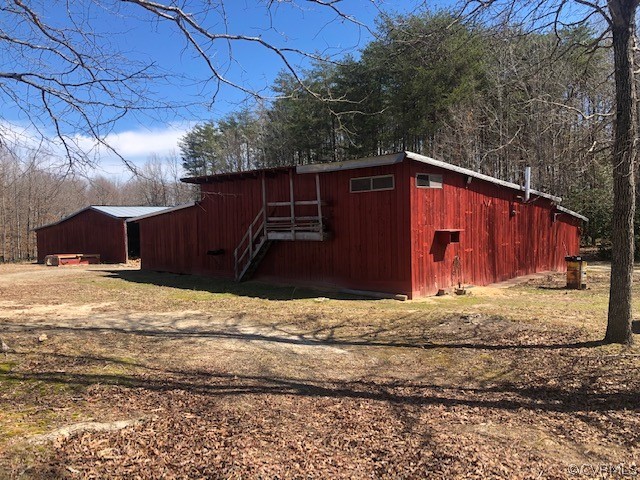 356 Wickham Road Bumpass, VA 23024 - Photo 11 of 15 a house view with a backyard space
