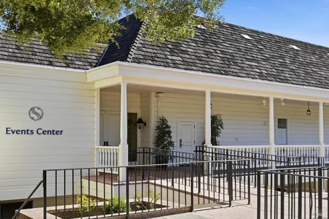a view of a golf course with a lake