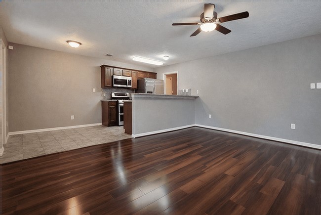 2518 Staples Street Houston, TX 77026 - Photo 10 of 22 wooden floor in an empty room with a window