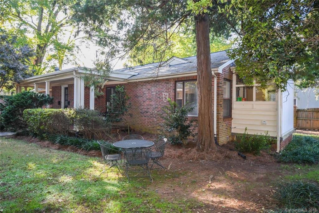2408 Providence Road, Unit 6 Charlotte, NC 28211 - Photo 2 of 20 a view of a house with backyard and sitting area