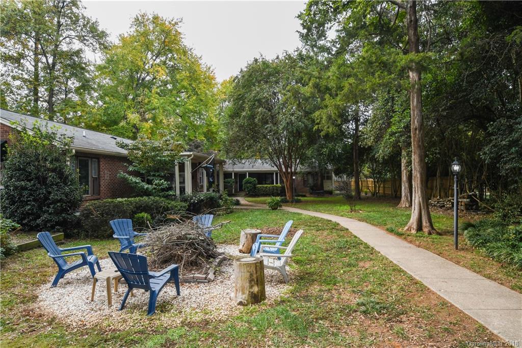 2408 Providence Road, Unit 6 Charlotte, NC 28211 - Photo 20 of 20 a view of a house with backyard sitting area and garden