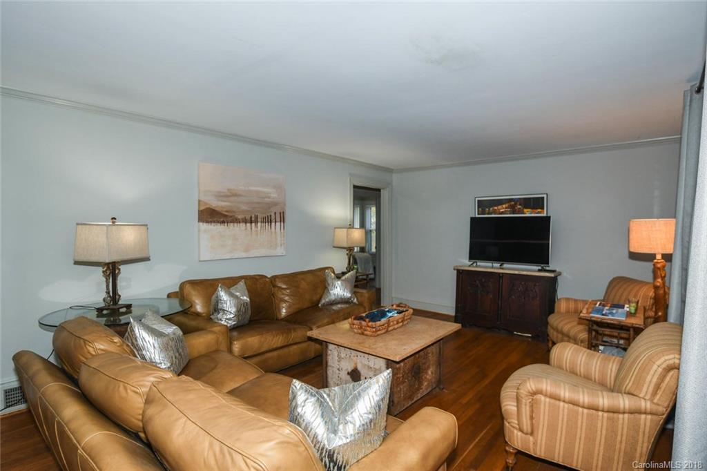 2408 Providence Road, Unit 6 Charlotte, NC 28211 - Photo 6 of 20 a living room with furniture and a flat screen tv