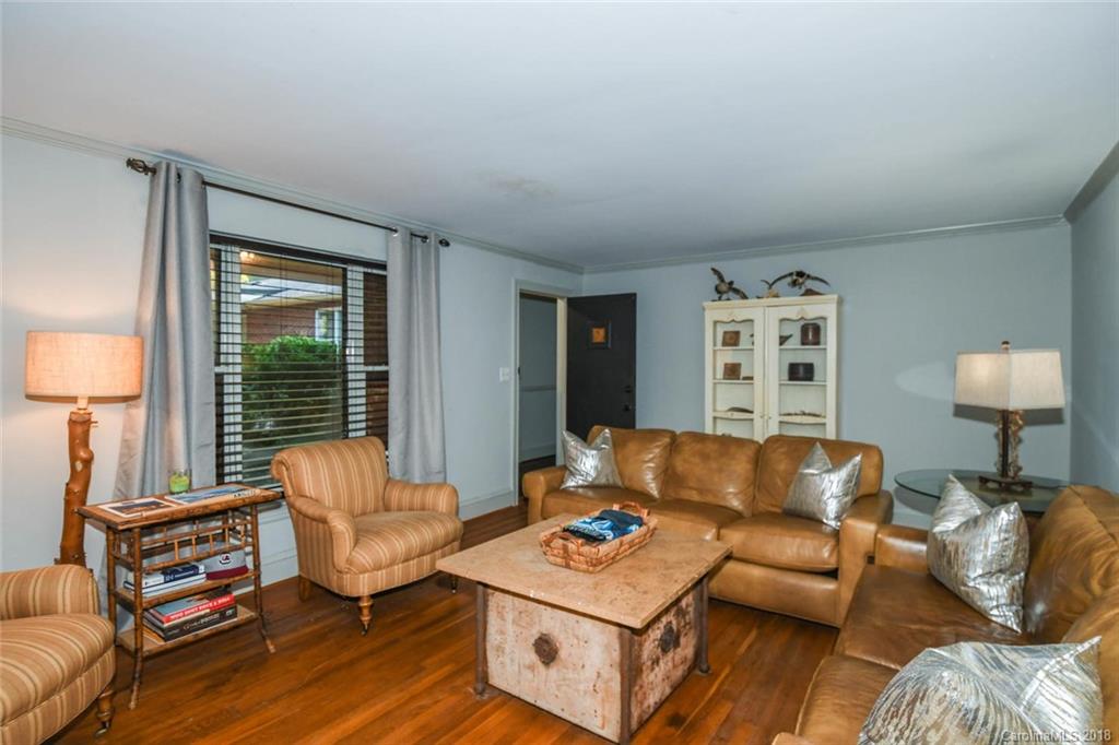 2408 Providence Road, Unit 6 Charlotte, NC 28211 - Photo 7 of 20 a living room with furniture and a window