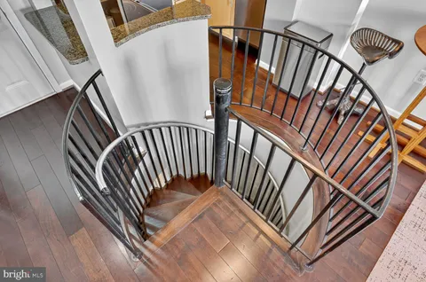 a view of entryway with wooden floor