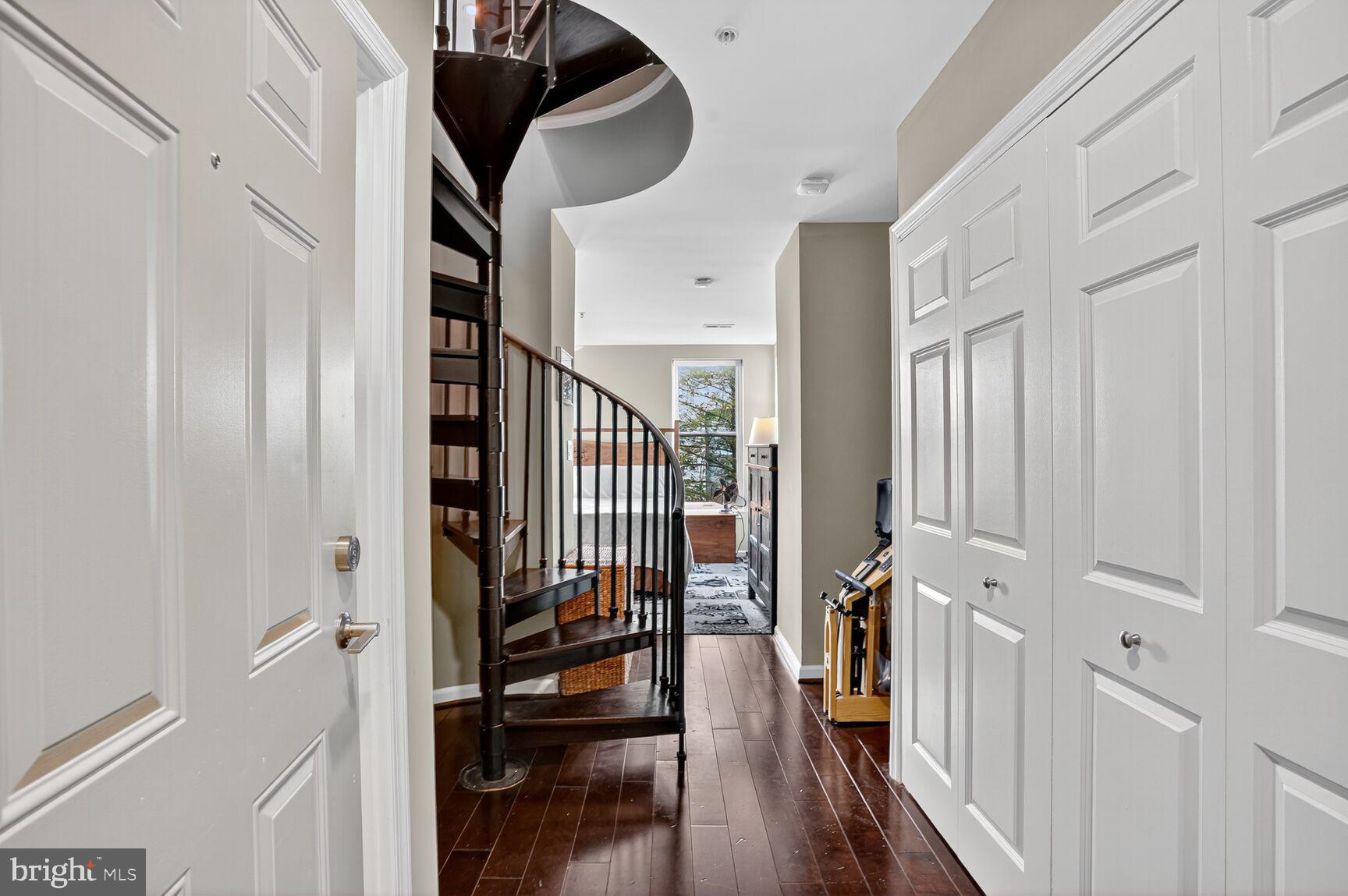 2627 Adams Mill Road Northwest, Unit 403 Washington, DC 20009 - Photo 16 of 38 a view of entryway with wooden floor