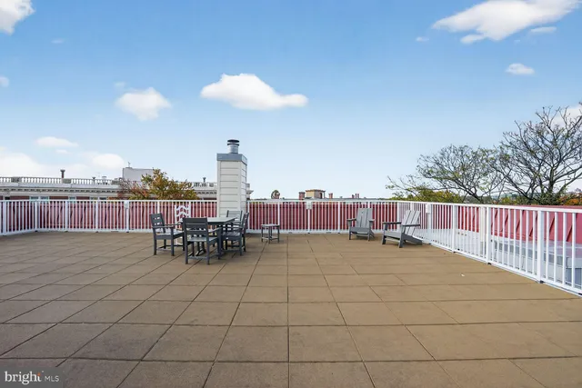 a view of a terrace with furniture