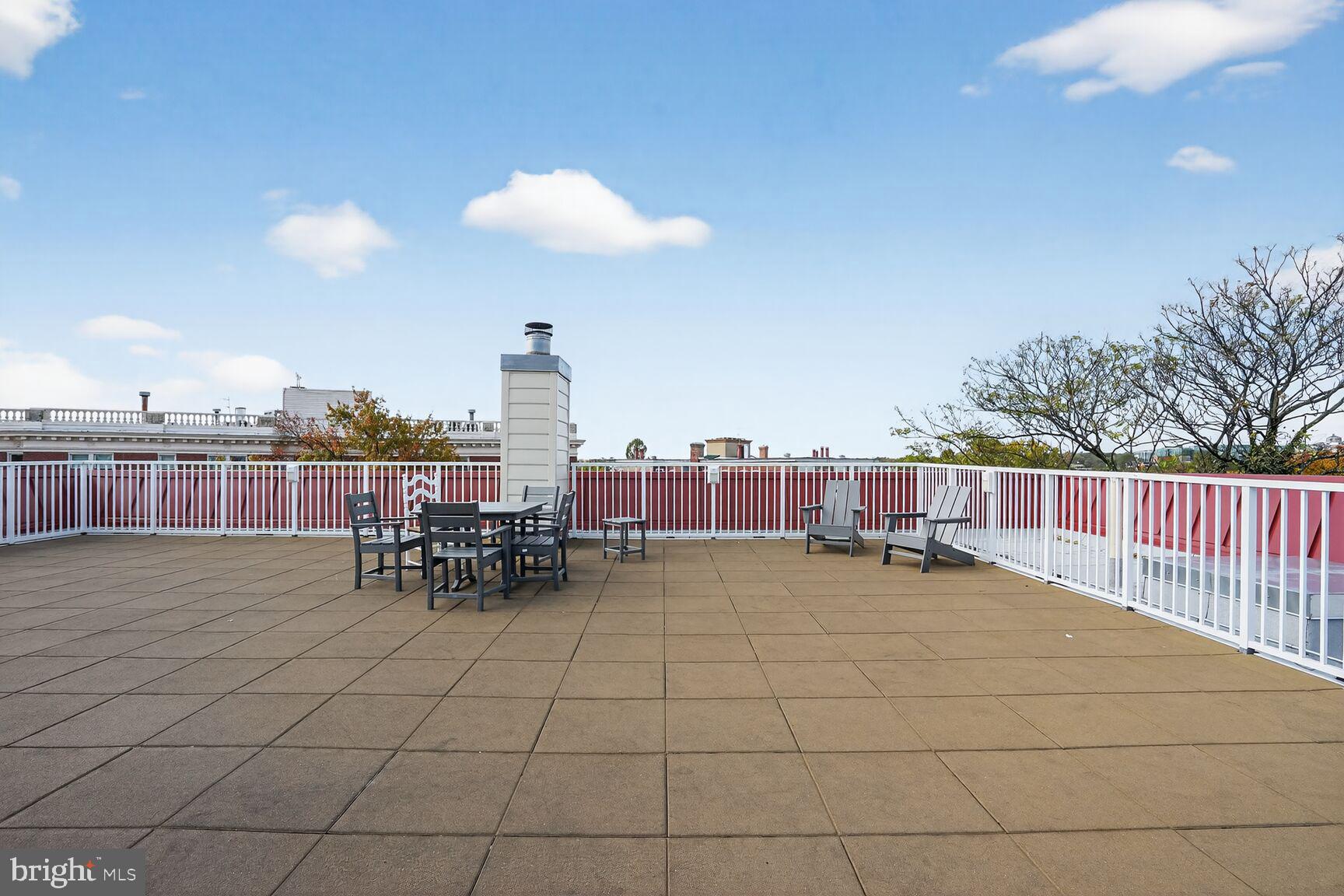 2627 Adams Mill Road Northwest, Unit 403 Washington, DC 20009 - Photo 29 of 38 a view of a terrace with chairs