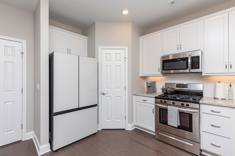 421 Alter Terrace Lebanon, TN 37087 - Photo 16 of 44 a white refrigerator freezer and a stove top oven