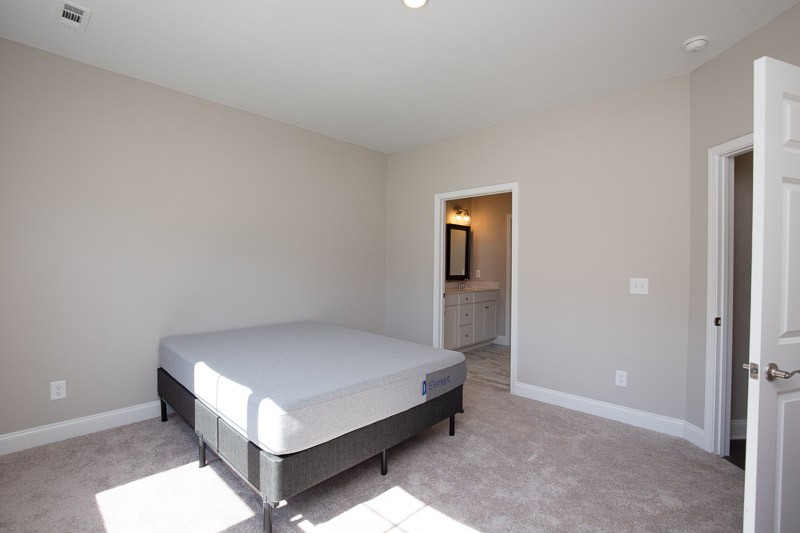 421 Alter Terrace Lebanon, TN 37087 - Photo 18 of 44 a room with a bed and a night stand